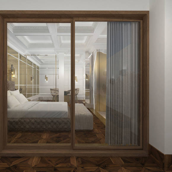 Elegant bedroom view through glass sliding doors with gold and marble interior design in Royal Golden Suite