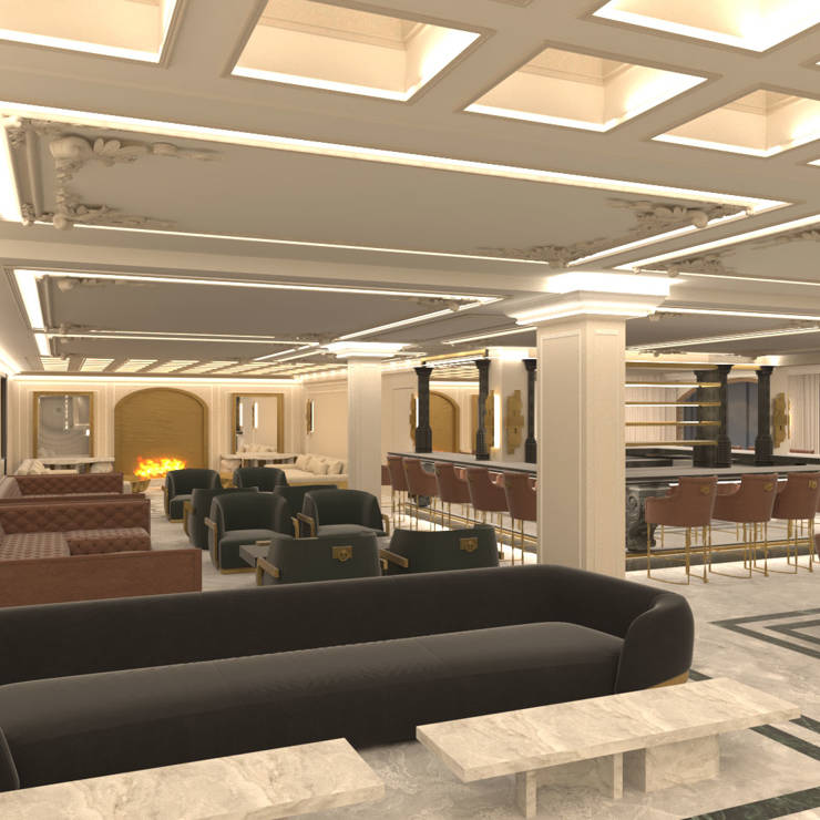 Elegant hotel lobby with bar area, plush seating, and refined lighting design in Royal Marmin Arachova