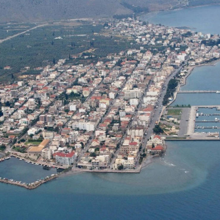 Aerial view of Itea coastal town near the sea