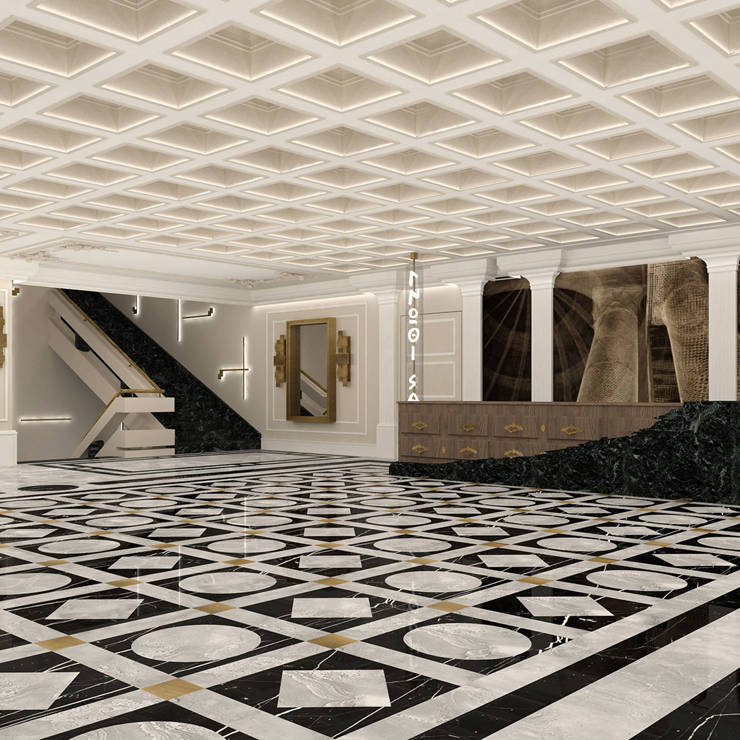 Grand hotel lobby with marble floors, sculpted ceiling panels, and elegant reception desk in Royal Marmin Arachova