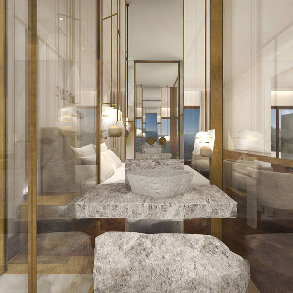 Deluxe room bathroom with stone sink, marble walls, and elegant gold details in Royal Marmin Arachova