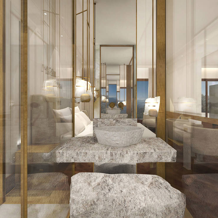 Deluxe room bathroom with stone sink, marble walls, and elegant gold details in Royal Marmin Arachova