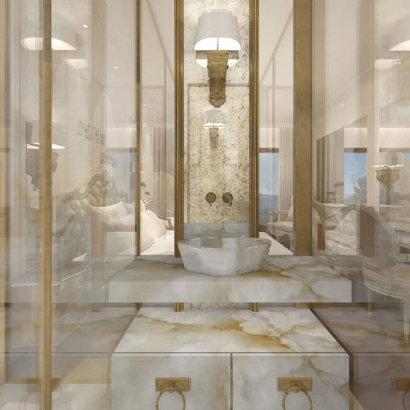 Luxurious marble bathroom with gold accents and elegant design in the deluxe room in Royal Marmin Arachova