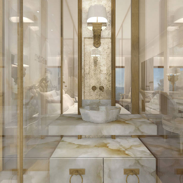 Luxurious marble bathroom with gold accents and elegant design in the deluxe room in Royal Marmin Arachova