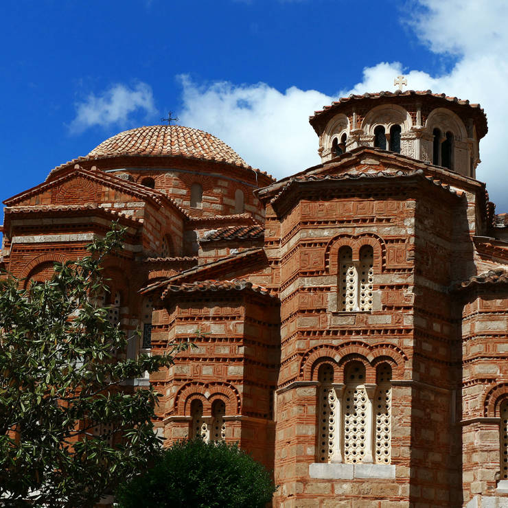 Byzantine architecture of Hosios Loukas Monastery with brick domes and stone arches