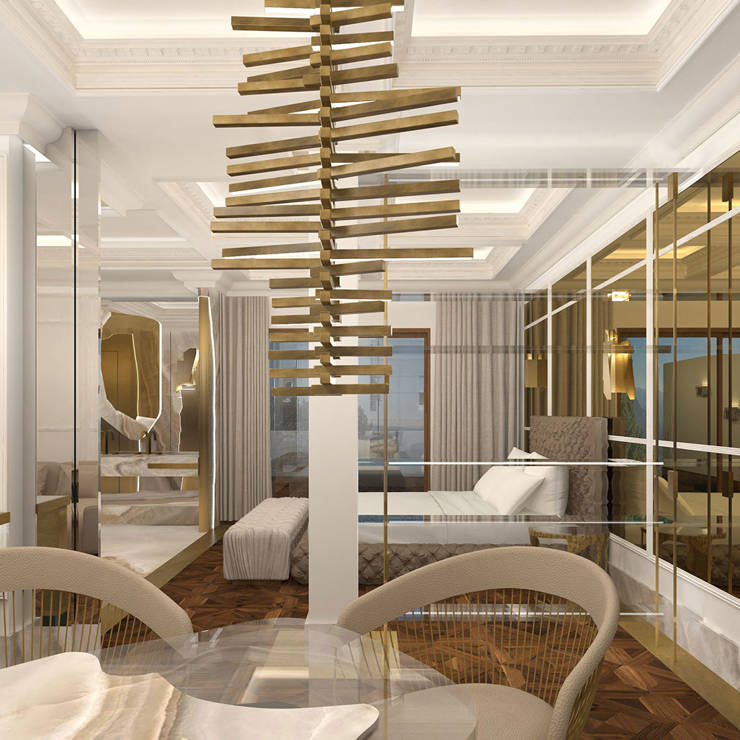 Contemporary suite interior with marble dining table, gold chandelier, and elegant bedroom view