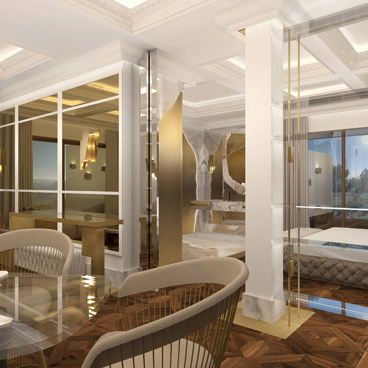 Spacious luxury suite with marble dining area, gold details, and mountain view through large windows