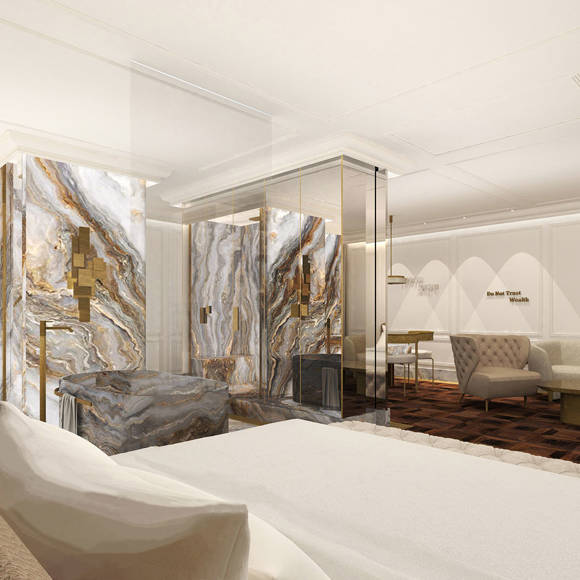 Refined Presidential Blue Suite featuring marble accents, fireplace, and elegant gold finishes with mountain views