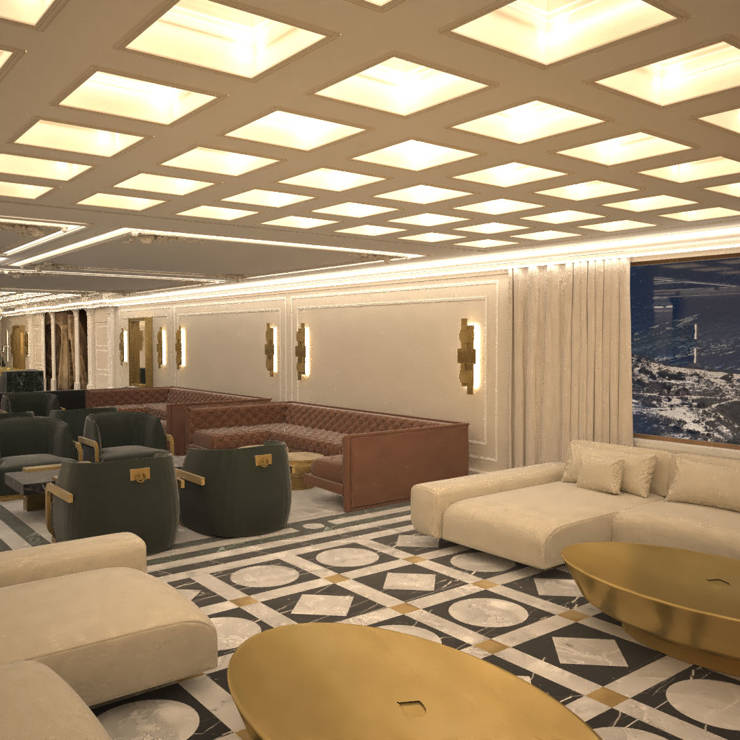 Spacious hotel lobby with modern ceiling lighting, elegant seating, and mountain view artwork in Royal Marmin Arachova