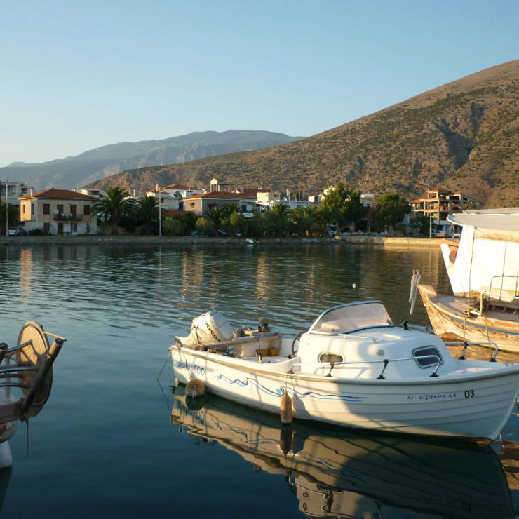 Fishing boats moored in the clear waters of the harbor at Kirra