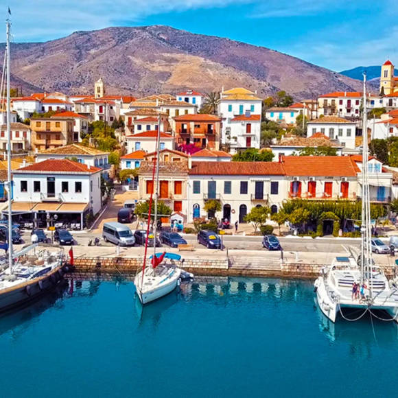 Galaxidi seaside village with boats in the sea and traditional archtecture